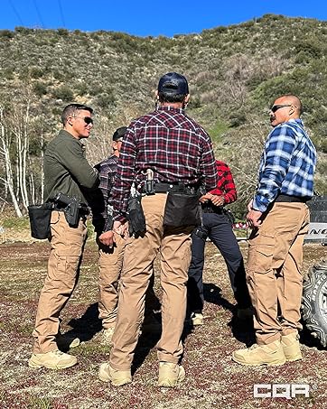 4 men wearing CQR Flannel shirts with tactical pants